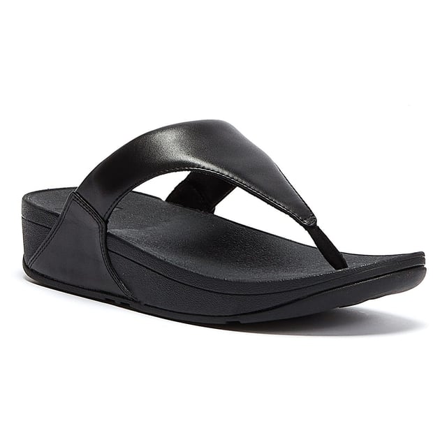 FitFlop Dames Lulu™ Sandalen - (Zwart) De Lulu™ sandalen van FitFlop zijn perfect voor het strand en de zomer. Slip on sandalen met leren bovenwerk en een Microwobbleboard™ tussenzool met driedubbele dichtheid die extra comfort biedt van schokabsorptie tot drukverspreiding. - APMA (American Podiatric Medical Association) Seal Of Acceptance om een goede voetgezondheid te bevorderen - Naadloos ingebouwd voetboogcontour - Slipbestendige rubberen buitenzool