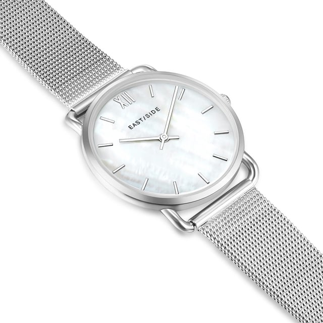 Are you a woman who is interested in the beautiful things in life? Wonderful! Then you will guarantee this stylish wristwatch with a pearl dial from Eastside. The high -quality processed watch convinces with its clear look, which makes it reliable companion in the turbulent everyday life. But even after work, you make a top figure with this watch on the wrist. In the heart of the timepiece, a quartz clock is beaten by second. Regardless of where you are traveling in the city: On the optimally structured dial with lineindicies, you can read the exact time and no longer miss an important meeting with colleagues or friends.