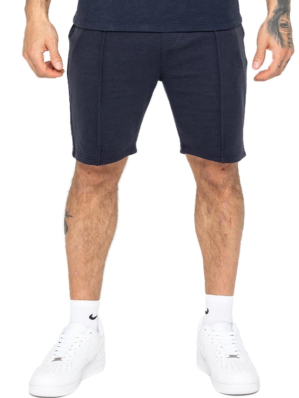 Enzo Mens Casual Stretch Shorts offer comfort and convenience with 2 side & 2 back pockets, elastic waistband & adjustable drawstring, and front pin tuck seam detail for added style and functionality. Perfect for errands or lounging with a practical and stylish design.
