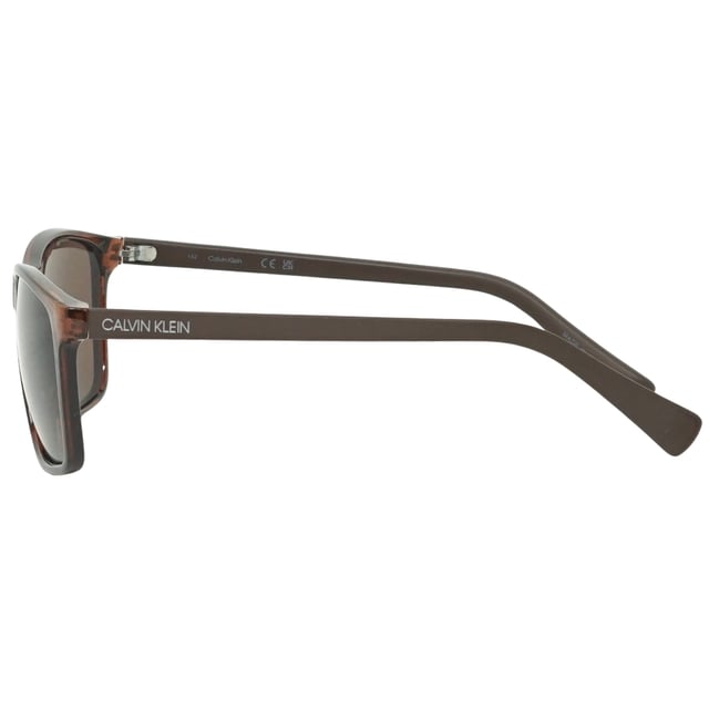 Calvin Klein CK19568S 210 Brown Sunglasses. Protect your eyes from the sun in style with these Calvin Klein Brown Sunglasses. Their lightweight design ensures maximum comfort and their lenses offer 100% UV protection. The sleek Brown frames make these sunglasses the perfect addition to any outfit. Arm Length = 140 , Lens Length = 58, Nose bridge =  15. Brown Sunglass, Brown Lens. Sunglasses, Sunglasses Case, Cleaning Cloth and Care Instructions all Included, 100% Protection Against UVA & UVB Sunlight and Conform to British Standard EN 1836:2005. Style Code : CK19568S 210