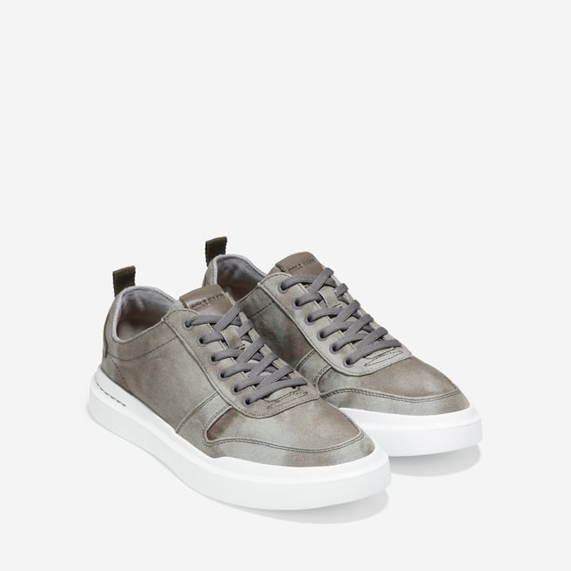We've given our much-loved, signature GrandPro Rally Court Sneaker an update in organic canvas. Crafted from high-end-yet-durable materials, it features a luxuriously cushioned GRANDFOAM footbed, an EVA outsole, and a classic old-school sneaker vibe
