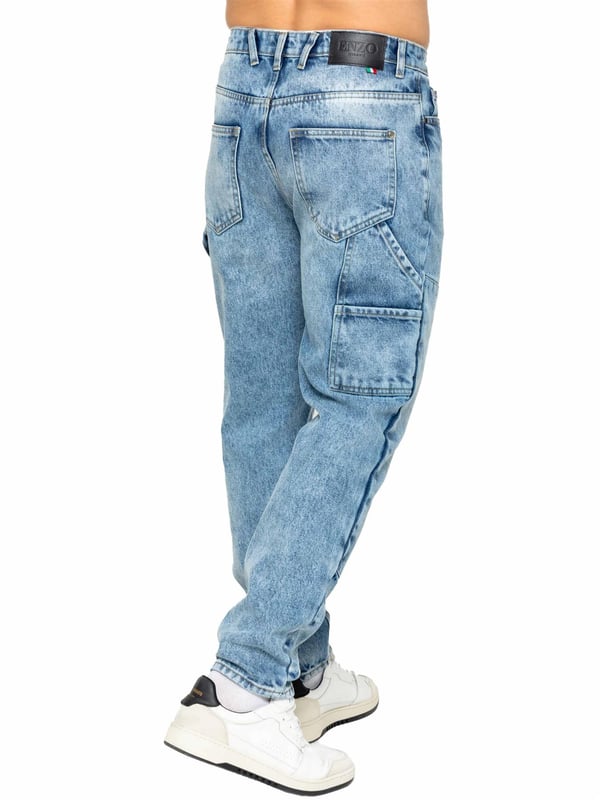 These jeans feature self-fabric panels, a loop on the left, and a loose fit for maximum ease. Other details such as the branded button, rivets, faux leather waist patch, and metal badge add a touch of personality. Choose between a relaxed fit for comfort and mobility, a timeless straight-leg cut, or a contemporary tapered fit. The signature utility pockets and hammer loop not only add functionality but also bring a unique style to the jeans.