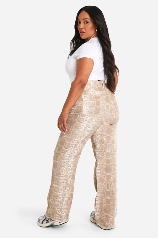 Wide leg silhouette for a relaxed, on-trend look
        Textured croc-print pattern adds visual interest
        High-rise waist for a flattering fit
        Denim fabric offers durability and comfort
        Versatile design suitable for various casual occasions
    
    Make a bold statement with these eye-catching plus-size jeans from Boohoo. The wide-leg silhouette combines comfort with style, while the unique croc-print pattern adds a touch of wild sophistication to your ensemble. Perfect for the fashion-forward woman who loves to stand out, these jeans can be dressed up or down for various casual events. Pair them with a crisp white crop top and trainers for a laid-back daytime look, or style with a sleek bodysuit and heeled boots for an evening out with friends. The high-rise waist flatters your curves, making these jeans an ideal choice for family gatherings or casual outings. Embrace your individuality and let your style roar with these standout denim trousers that are sure to turn heads wherever you go.