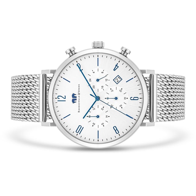 The high-end men's watch from the Rhodenwald & Sons manufacture combines the functionality of sporty chronographs with the subtle elegance of a dresswatch. The functions of 24-hour display, stopwatch and date are integrated into a tone-in-tone dial-a perfect companion not only in the office, but also in leisure time, for a suit as well as for jeans. The model convinces with a robust stainless steel housing, slim sticker, totalists in the popular tricompax arrangement and a durable quartzwerk. Consistent eye-catcher is the filigree mesh look of the Milanaise bracelet made of stainless steel.