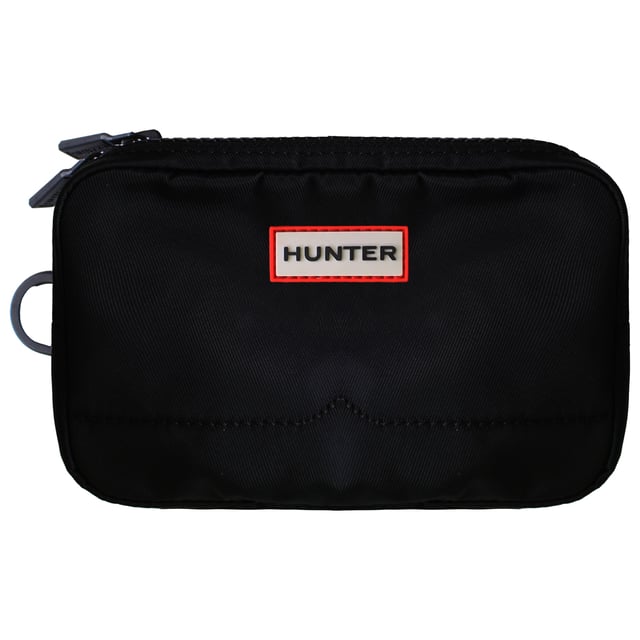 The Hunter Nylon Keeper Phone Pouch is a stylish and functional accessory designed to keep your phone and essentials secure while on the go. Crafted from durable and water-resistant nylon, this compact pouch is perfect for everyday adventures, whether in the city or outdoors.
Â 
Key Features:
Durable Nylon Construction: 

Lightweight yet sturdy, providing long-lasting performance.


Water-Resistant Finish: 

Helps protect your phone and essentials from unexpected rain or splashes.


Adjustable Crossbody Strap: 

Allows for hands-free carrying with a customizable fit.


Secure Zip Closure:

Ensures your phone and small valuables stay safe and protected.


Compact &amp; Functional Design: 

Perfect for carrying a phone, keys, cards, and other small essentials.


Subtle Hunter Branding: 

Features the classic Hunter logo for a signature touch.


Versatile Styling: 

Ideal for everyday wear, travel, festivals, or outdoor activities.


Â 
The Hunter Nylon Keeper Phone Pouch is a must-have accessory for those who want a stylish, practical, and protective solution for carrying essentials without the bulk of a full-size bag.