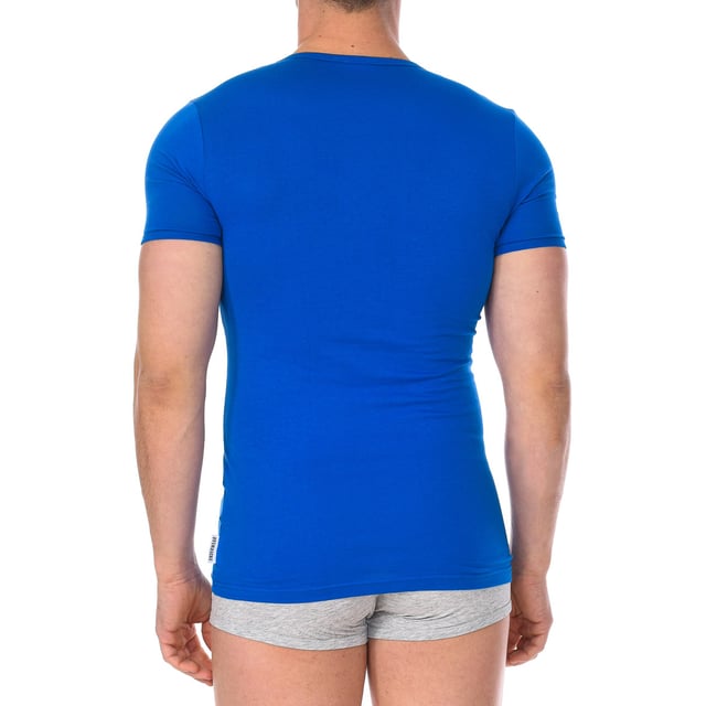 Bikkembergs short sleeve t-shirt.
 Color blue
 Round neck with ribbed finish.
 Fabric label personalized by the brand, on the upper side.
 Comfortable and breathable fabric.
 Seams seen in tone.

 Composition: 95% Cotton, 5% Elastane

 Care:
 -Wash at max temperature. 40ºC.
 -Do not use bleach.
 -Supports dry cleaning.
 -Allows you to use dryer.
 -Iron at max temperature. 130ºC.
 Composition: 95% Cotton, 5% Elastane
 Care:
Care:
 -Wash at max temperature. 40ºC.
 -Do not use bleach.
 -Supports dry cleaning.
 -Allows you to use a dryer.
 -Iron at max temperature. 130ºC.