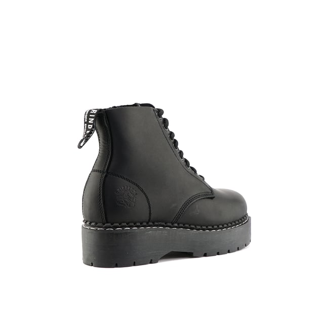 The Charlie by Grinders is a standout update to the classic derby boot, expertly designed for modern wearers. This style features an 8-eyelet lace system for a secure fit and a practical side zip for effortless entry and exit. The boot is built with Goodyear welted construction, enhancing its durability and robustness. It boasts extra thick soles for superior comfort and protection, while Grinders' Air Cushioned Soles (ACS) provide excellent support and shock absorption. Made with premium leather uppers and full grain leather, the Charlie offers both a sophisticated look and lasting performance, making it a versatile addition to any footwear collection. 8 Eyelet Derby Boot, Goodyear Welted, Extra Thick Soles, Side Zip, Grinders’ Air Cushioned Soles (ACS), Leather Uppers, Full Grain Leather