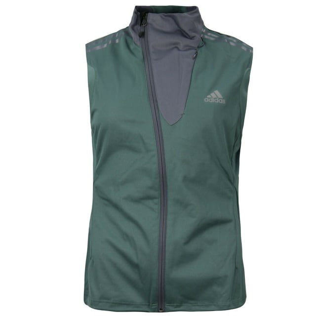 Het Adidas Originals Women's Athletic Vest Full Zip Gilet Bodywarmer is een specifiek item uit de collectie van Adidas Originals. Hier is een overzicht van de kenmerken op basis van de verstrekte informatie:

 Ontwerp: De gilet bodywarmer heeft een mouwloos ontwerp, waardoor het ideaal is om over andere kledingstukken heen te dragen. Het heeft typisch een volledige ritssluiting aan de voorkant, zodat je het gemakkelijk aan en uit kunt trekken.

 Materiaal:  De specifieke samenstelling van het materiaal wordt niet vermeld. Adidas gebruikt echter vaak een combinatie van polyester, nylon of andere synthetische materialen in hun sportvesten voor lichtgewicht, ademende en waterbestendige eigenschappen.

 Kleur: De kleurbeschrijving is niet gespecificeerd in de verstrekte informatie. Het wordt aanbevolen om de productafbeeldingen of beschrijvingen te raadplegen voor nauwkeurige kleurdetails.

 Adidas Originals-logo:  Als onderdeel van de Adidas Originals-lijn is de bodywarmer waarschijnlijk voorzien van het iconische Adidas Originals Trefoil-logo of andere Adidas-merkelementen. De plaatsing en het ontwerp van het merk kunnen variëren, dus het is raadzaam om de productdetails of afbeeldingen te controleren voor precieze informatie.