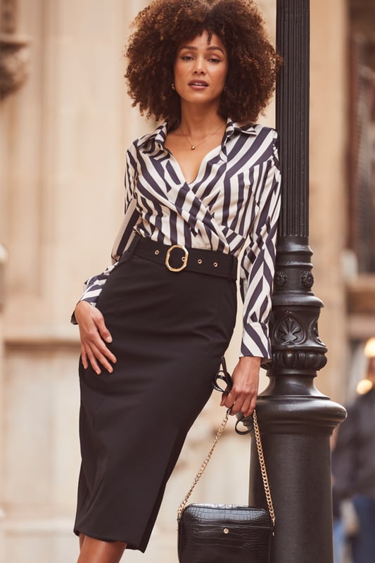 REASONS TO BUY:

Power dressing
2-in-1 style - we've done the hard work for you
That wrap top is so flattering
Crafted from the silkiest satin fabric
Waist-cinching, hip-hugging pencil skirt
Think courts or strappy heels