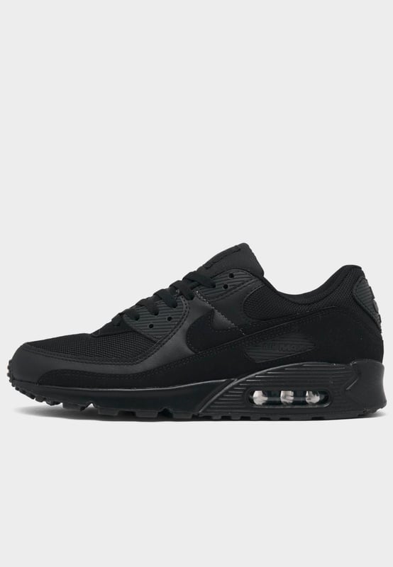 Step up your sneaker game when you step out in the classic Men's Nike Air Max 90 Casual Shoes. Low top silhouette with padded collar and tongue for comfort. - - . Retro runner turned lifestyle sneaker design. - - . Textile upper with synthetic and leather overlays. - - . Nike Max Air unit in heel for support and cushioning. - - . Flexible sole design encourages a more natural stride. - - . Rubber outsole with waffle traction pattern. - - . The Nike Air Max 90 is imported.