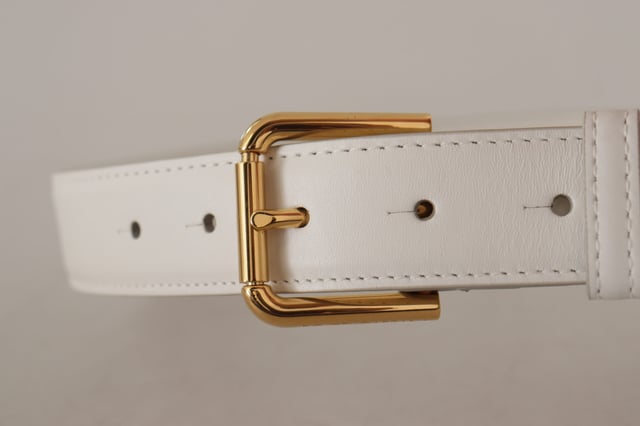 100% Authentic Dolce & Gabbana leather belt
  Crafted from Quality leather
  Gold logo engraved buckle
  Made in Italy
  Width: 3 cm
  Designed for women
  Classic white color with logo details
Material: Leather