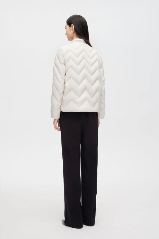 This jacket features 700+ fill goose down, custom buttons, soft-touch fabric, and an H-shape silhouette ideal for women's business styling.

LUXURIOUS 700+ FILL GOOSE DOWN:;Ultra-light insulation of exceptional quality.

PREMIUM ACCENTS: Exclusive custom-made buttons, beautifully designed.

LIGHTWEIGHT SOFT TOUCH FABRIC: Ultra-fine yarns, light and dense for ultimate comfort and warmth.

H-SHAPE SILHOUETTE: Perfect for men, shorter lengths ideal for business styling.