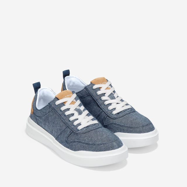 We've given our much-loved, signature GrandPro Rally Court Sneaker an update in organic canvas. Crafted from high-end-yet-durable materials, it features a luxuriously cushioned GRANDFOAM footbed, an EVA outsole, and a classic old-school sneaker vibe