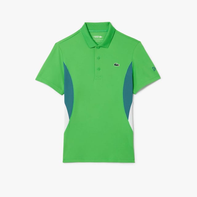 Lacoste Tennis x Novak Djokovic Ultra-Dry Polo Shirt.- Recycled polyester made from manufacturing offcuts.- Regular fit, straight cut.- Contrast sides.- Tested by tennis players.- Silicone crocodile on chest. Material: 100% Polyester. Ref: DH7330IXU.