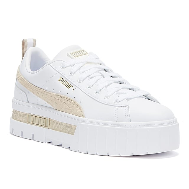 PRODUCT STORY : We made this one for the hype girls, street enthusiasts and trend mavens - basically for those who want to stand out with sophisticated swagger. Taking design elements from the urban environment and injecting them with extra edge, the Mayze encompasses attitude. Crisp and clean, with a luxurious leather upper, sleek suede overlays, eye-catching colour contrasting and a seriously stacked sole, these trend-setting trainers will be the envy of every onlooker. DETAILS : Leather upper with suede and synthetic overlays Glossy eyelets Elevated rubber midsole with textured tooling Rubber outsole Lace closure for a snug fit PUMA branding at tongue Foil-printed PUMA No.2 Logo at quarter PUMA Formstrip at medial and lateral sides PUMA Wordmark at tooling Foil-printed PUMA Cat Logo at heel
