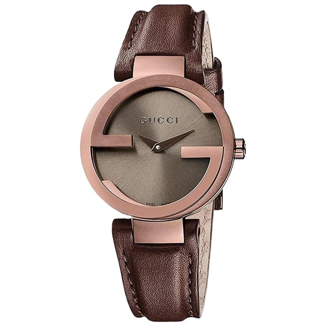 General: Color: Brown Case: Case Size: 29 mmCase Thickness: 6 mmCase Material: Stainless SteelCase Shape: RoundCase Back: Solid Band: Band Material: Calfskin LeatherBand Type: StrapBand Color: BrownBand Length: 7 inchesBand Width: 14 mmClasp: Tang Dial: Dial Color: BrownType: AnalogCrystal: Scratch Resistant SapphireHands: BlackSecond Markers: No Markers. The Gucci name appears below the 12 o'clock position Bezel: Bezel: Fixed Interlocking GBezel Color: Brown PVDBezel Material: Stainless Steel Crown: Crown: Pull / Push Information: Brand: GucciCollection Name: InterlockingGender: Women'sModel: YA133504Watch Label: Swiss MadeMovement: Quartz Features: Water Resistance: 50 meters / 165 feetFunctions: Hour, MinuteWatch Features: Stainless Steel, Leather, Analog Additional Info: Watch Style: LuxuryUPC Code: 731903334441Sku: YA133504Department: WatchesCategory: Watches