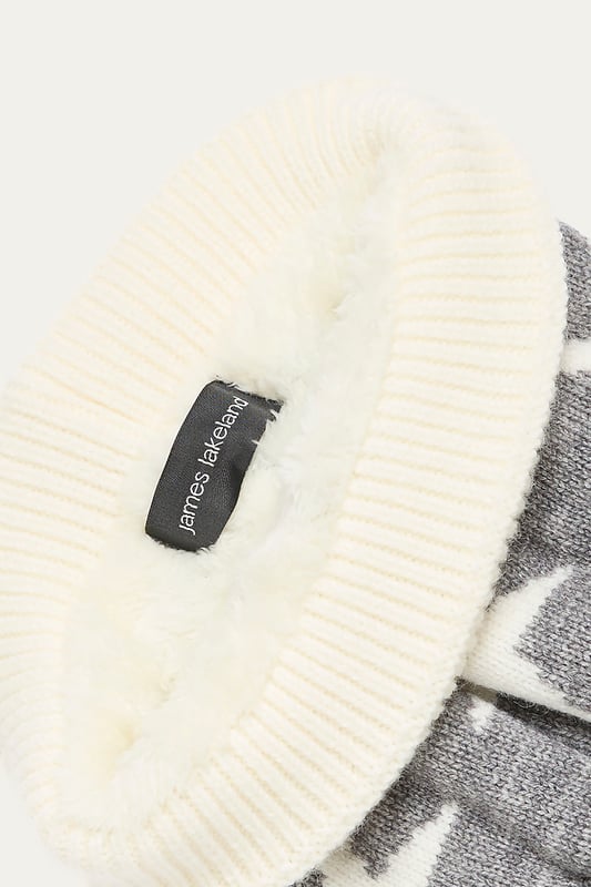 Stay cozy and stylish with this extra soft mohair-style hat from James Lakeland. Featuring a faux fur pompom and a ribbed edge, this warm winter hat is adorned with beautiful knitted stars. It’s the perfect accessory to keep you warm during the colder months.
