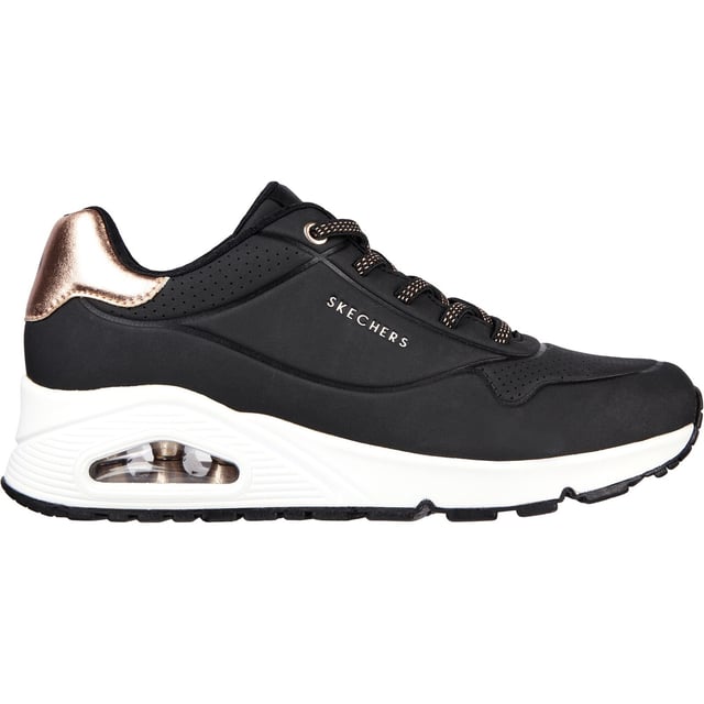 Slip-on a classic style in comfort wearing Skechers Street Uno - Shimmer Away. This fashion sneaker features a synthetic durabuck upper with a metallic trim, stretch laces, Skechers Air-Cooled Memory Foam insole and Skech-Air visible airbag midsole.