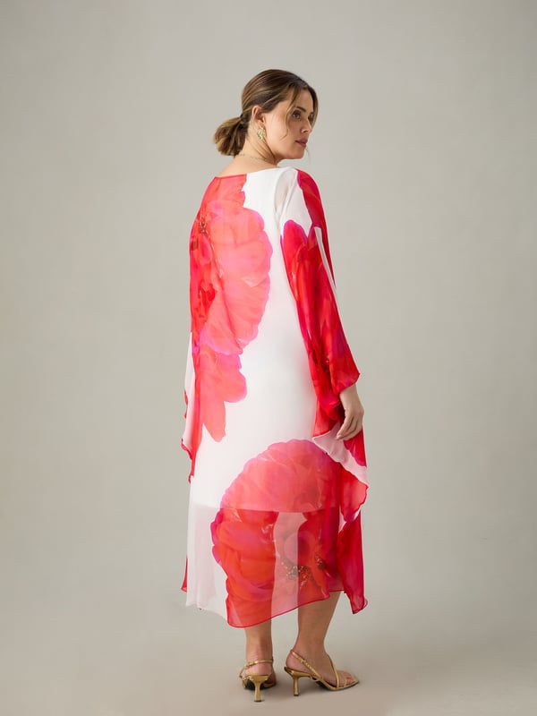 Printed all over with a striking red floral print, this kaftan dress is cut from a floaty chiffon with a soft jersey lining for comfort and coverage. It has a round neckline and loose, floaty sleeves, as well as a high-low hem thats endlessly flattering. Dress up or down, this is the perfect dress for holidays or weddings.