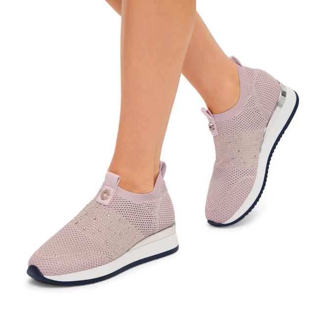 The Carvela Janeiro2 trainer features a pale pink knitted upper in a low top sock-style. There is a pink crystal embellishment across the toe with gold Icon C metal stud. This product features All Day Long Technology.
