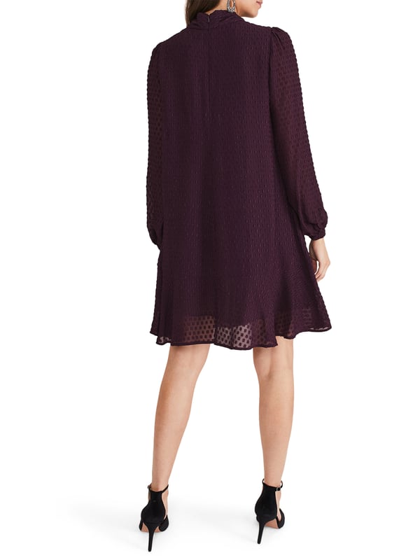 Elevate your wardrobe with the luxurious Everly Swing Dress - a textured piece in a rich plum shade perfect for any casual occasion.