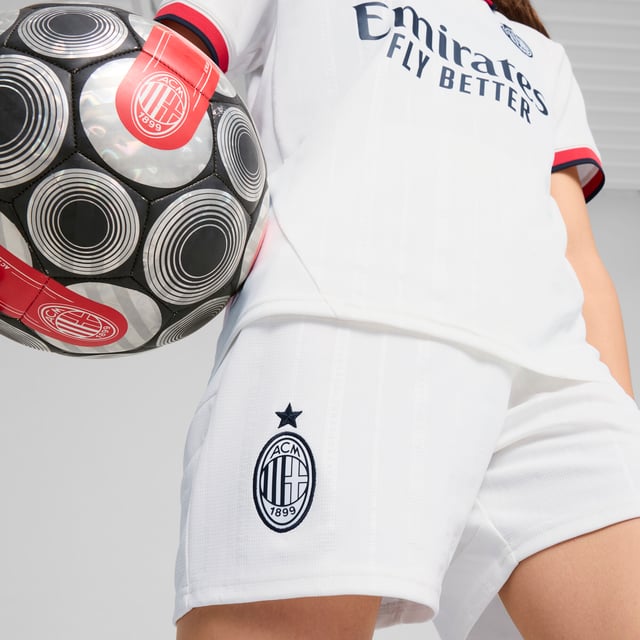 PUMA Boys AC Milan 24/25 Shorts PRODUCT STORY: Hit the pitch like AC Milan's finest in these football shorts. They're made from sweat-wicking material to keep you cool in the tensest moments of the game and are finished with the team's famous crest on the leg. FEATURES & BENEFITS: dryCELL: Performance technology designed to wick moisture from the body and keep you free of sweat during exercise; As part of the RE:FIBRE program, this garment is made of at least 95% recycled material from textile waste and other used materials. DETAILS: Regular fit; 170 gsm, Jacquard; Medium rise; Official team branding; PUMA branding details; PUMA Youth: Recommended for older kids between 8 and 16 years.