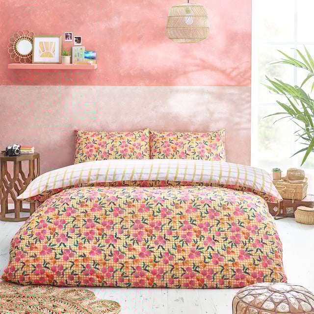 Make a statement with the Juicy duvet set. Featuring juicy peaches on a gingham base. The colour continues to the reverse with pink and yellow gingham design so you can switch the look when you need to.