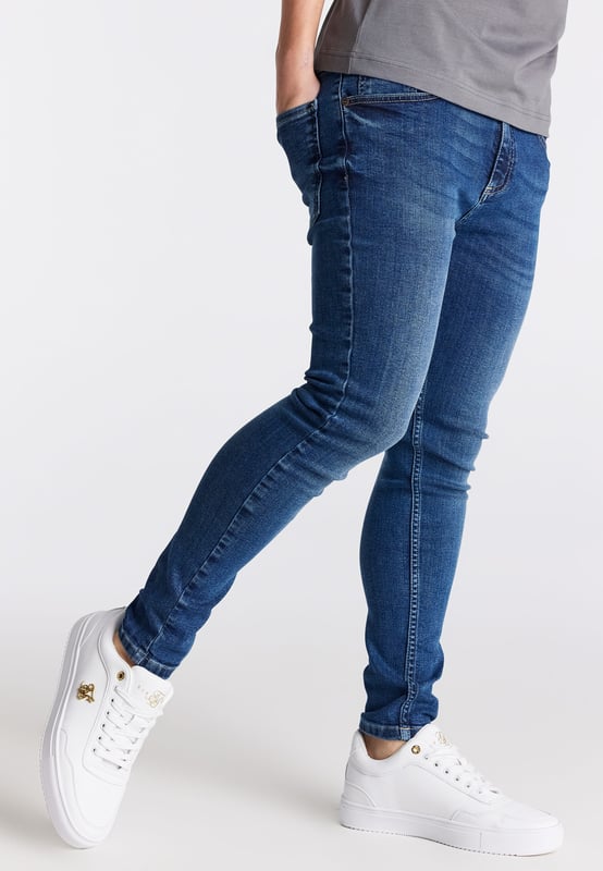 inchBoys Essential Midstone Skinny Denim JeanStretch DenimButton Waist with Belt LoopsTan Pu Patch With LogoMachine Wash98% Cotton 2% Elastane inch
