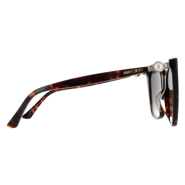 Jimmy Choo Cat Eye Womens Havana Brown Gradient RUA/G/S  Sunglasses showcase a stylish cat-eye frame with jewel accents on the hinges. Elegant and glamorous, these sunglasses elevate any look with a touch of luxury.