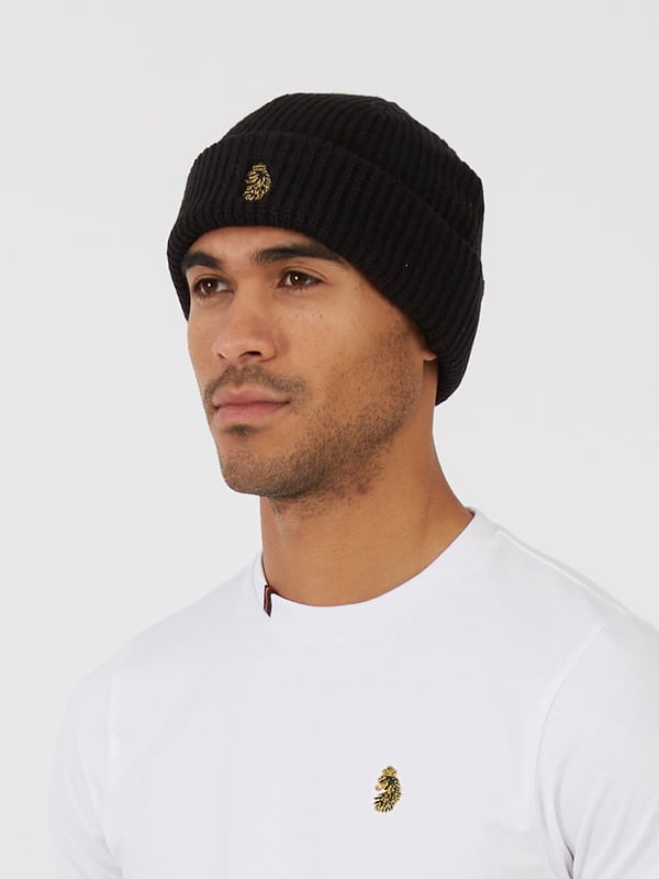 This beanie from LUKE is crafted from a ultra-soft knit in a ribbed construction that guarantees a secure fit and locks in heat. It features a fold-over cuff complete with the brand's iconic lion head embroidery at the front. 