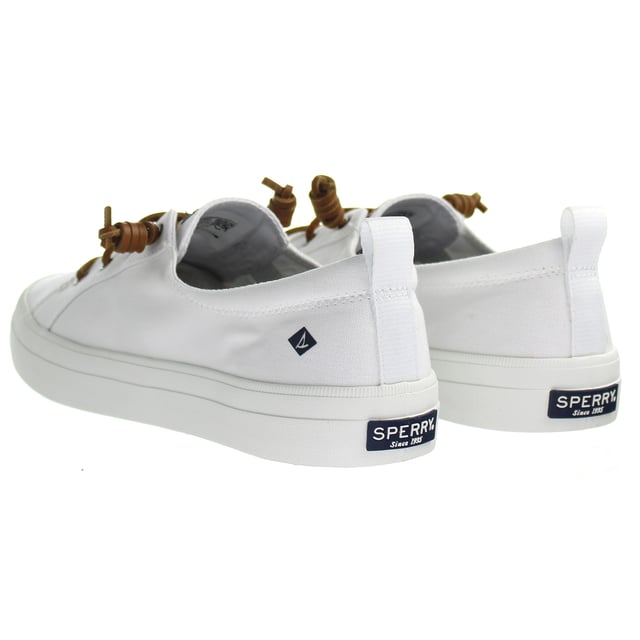Sperry Crest Vibe Women's White Plimsolls – the perfect fusion of timeless style, coastal inspiration, and everyday comfort. These plimsolls are designed to elevate your casual look while providing exceptional comfort for all-day wear.

Key Features:

 Classic Coastal Charm:  The Crest Vibe Women's White Plimsolls by Sperry capture the essence of coastal living with their classic yet modern design. Whether you're by the shore or exploring the city, these plimsolls exude a relaxed elegance that complements various outfits.

 Quality Craftsmanship:  Crafted by Sperry, a brand renowned for its nautical heritage, these plimsolls boast impeccable craftsmanship. The attention to detail in their design ensures durability and a lasting style that withstands the test of time.

 Day-Long Comfort:  Featuring a cushioned insole and a padded collar, these plimsolls provide exceptional comfort that lasts from morning till night. The cushioning supports your feet throughout your activities, making them ideal for both leisure and light adventures.

 Effortless Slip-On Style:  The convenient slip-on design of the Crest Vibe plimsolls ensures easy on-and-off wear. Whether you're in a rush or seeking a hassle-free footwear option, these plimsolls are your go-to choice.

 Versatile White Hue:  The pristine white color of these plimsolls offers versatility in pairing with a range of outfits. From casual dresses to jeans and shorts, these plimsolls effortlessly elevate your style, making them a wardrobe essential.

 Non-Marking Outsole:  The non-marking rubber outsole not only provides reliable traction but also ensures that you can wear these plimsolls indoors without leaving scuff marks. This feature adds to the versatility and practicality of the shoes.