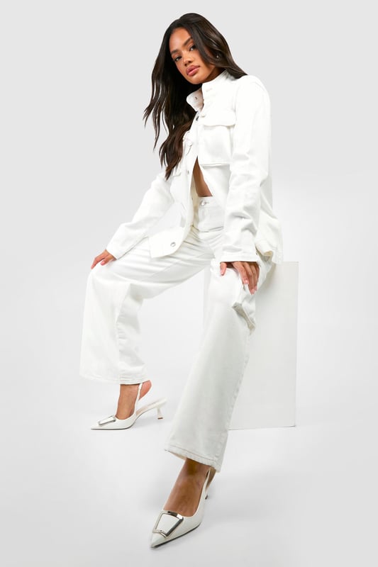 Wide-leg design for a relaxed, on-trend silhouette
        Cargo-style pockets add a utilitarian edge
        High-waisted fit for a flattering shape
        Zip-detail pocket for secure storage and added style
        Versatile denim fabric suitable for various casual occasions
    
    Make a bold statement with these eye-catching denim cargo trousers. The wide-leg cut offers a contemporary twist on classic jeans, whilst the high-waisted design accentuates your curves. The standout feature is the zip-detail pocket, adding both practicality and an edgy aesthetic. Perfect for the fashion-forward woman who values both style and functionality, these trousers can be dressed up or down with ease. For a chic daytime look, pair with a cropped jacket and sleek trainers, as seen on our model. Alternatively, style with a fitted bodysuit and heeled mules for an evening out with friends. The denim fabric ensures comfort and durability, making these trousers a versatile addition to your wardrobe for family gatherings, casual outings, or relaxed weekends about town.