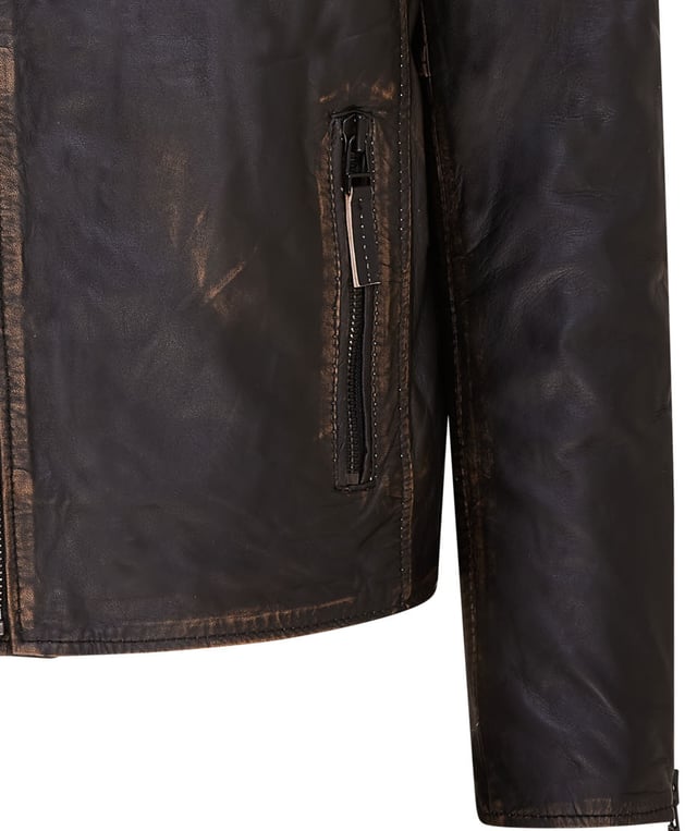 The centrepiece of a timeless look, this jacket is crafted with full grain nappa leather to achieve a slim fit stylish biker silhouette. Eye catching additions to this piece include ribbed detailing on the shoulders and a traditional wide collar. The front of the jacket is accented with a double zip and features a slanted zip pocket across the breast as well as a further two zip pockets. This jacket comes in a range of colours to suit a variety of tastes, allowing all to find their ideal style in this classic Brando style piece.

• 100% premium ultra-soft nappa leather.
• Slanted zip breast pocket • Double zip front, tagged for ease of use
• Wide notch stud fastened lapels
• Pockets integrated into the jacket lining
• Ribbed detailing on the shoulders
• Stylish zipped cuffs