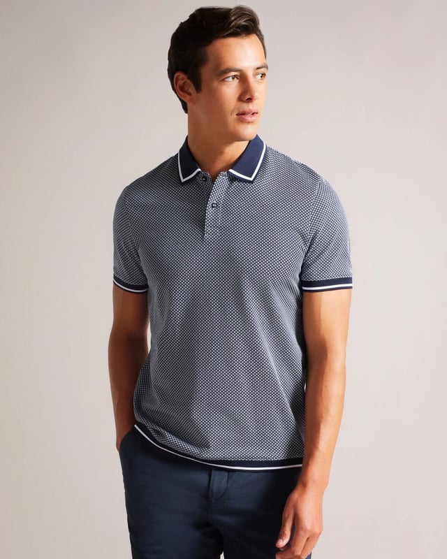Make way for AFFRIC. With plenty of style to go around, this classic polo is just what your wardrobe needs. Pair it with chinos, jeans or tailored trousers for a multitude of looks.


Polo shirt
Geometric design
100% Cotton
Short sleeved
Classic collar
Striped trims







100% Cotton
&nbsp;
263994






&nbsp;
&nbsp;