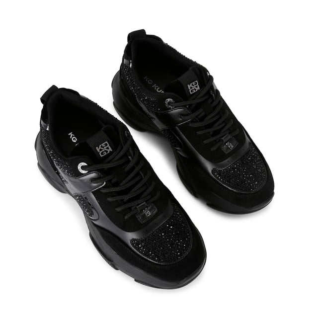 This KG Kurt Geiger Lucile Lace Up Gem sneaker is a chunky black style with crystal embellishment across the upper. The branding details are in a chic gunmetal and the exaggerated sole is in black rubber.