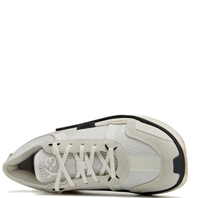 Mens Y-3 Ajatu Run Trainers in white.- Suede  double-layer textile and mesh upper.- Lace closure.- Lightstrike cushioning.- Collapsible feel.- Suede and mesh lining.- Rubber outsole.- Ref: GW8614