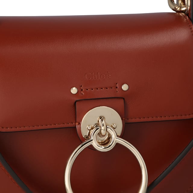 Small bag in shiny suede calfskin
  Main material: Calfskin
  Secondary material: Split calfskin
  Main lining: Linen
  Flap lining: Calfskin
  Carry: Hand, long shoulder &amp; cross-body
  
  - Width: 20 cm 
  - Height: 17 cm 
  - Depth: 7 cm 
  - Long strap drop min: 46 cm 
  - Long strap drop max: 57 cm 
  - Short strap drop: 22 cm 

  
  Colour: Sepia Brown
Measurments:  width: 70 mm length: 200 mm height: 170 mm strap length: 570 mm handle drop: 220 mm