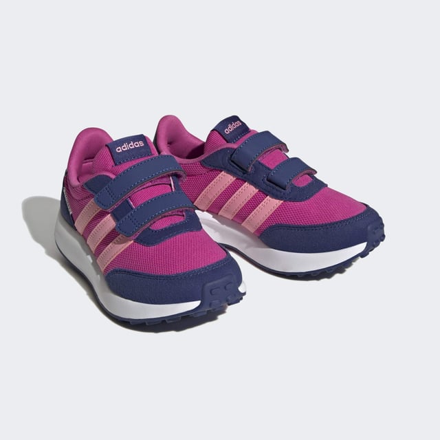 Bring your child a touch of the old school. These kids' adidas sneakers are inspired by '70s running shoes and have two hook-and-loop straps to ensure those feet stay in place. The Cloudfoam midsole is soft and cushiony to keep them comfortable throughout the day. Suede overlays on the toe and heel add a touch of nostalgia and texture to the look. Made with a series of recycled materials, and at least 50% recycled content, this product represents just one of adidas' solutions to help end plastic waste.  - Regular fit - Hook-and-loop closure - Closed mesh upper - Textile lining - Toe and heel protective overlays - Cloudfoam midsole - Rubber outsole - Upper contains a minimum of 50% recycled content  Shipped by adidas