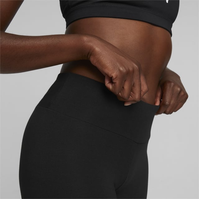 PRODUCT STORY: A good pair of short leggings can put you in the mood to get out there and break a sweat. Made of a soft cotton blend, these Essentials Logo Women's Short Leggings have a 7-inch inseam and come in a tight fit for a serious athleisurewear look. Throw an oversized sweater over the top for a relaxed, chic aesthetic. A PUMA No. 1 Logo on the left thigh is the finishing touch. DETAILS: Tight fit with 7" inseam; Elastic waistband for a form-fitting look; Rubber print PUMA No. 1 Logo on left thigh.