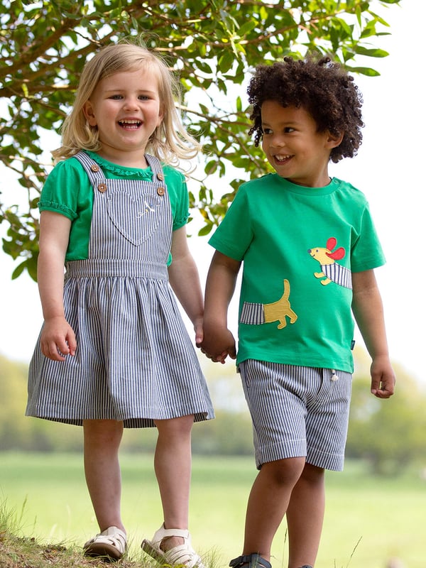 100% organic cotton | Proud to be certified to the Global Organic Textile Standard (GOTS) | Navy blue and cream ticking stripe | Bumble bee embroidery | Adjustable straps with coconut buttons | Front bib pocket | Elasticated waistband | Made in India | Machine washable at 40 degrees, or at 30 degrees to be kinder to the planet