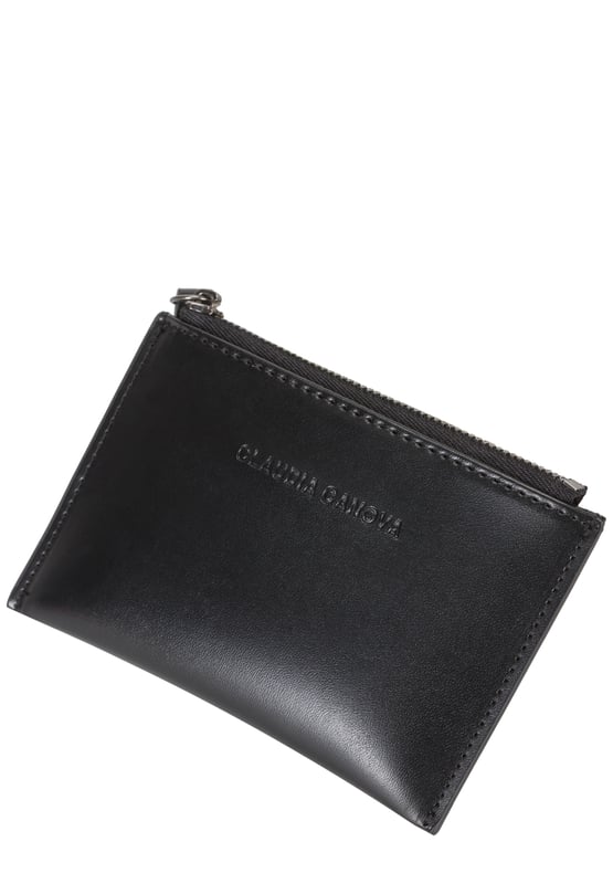 The ideal going-out purse, as it's perfectly sized to fit inside a clutch bag. Carry your essential cards in the card slots and keep your coins secure in the zip top section. Features: , Soft PU exterior, Claudia Canova blind debossed logo, Zip top closure, Chunky zip pull, 3 x card slots, 1 x transparent ID window