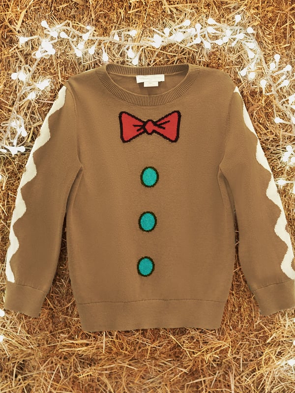 Stella McCartney incorporate excellent construction and vivid imagery into their beautiful aesthetics. This unisex nut brown jumper captures the label's refined detail and innovative outlook. Made with cartoon imagery with zig zag patterning down the arms.‚ Ribbed Trims ‚ Long Sleeves ‚ Bow and Button Imagery‚ Zig Zag Patterning ‚ Straight Hem‚ 100% CottonStella McCartney : Boys Height  2Y: 32-35" / 83-89cm3Y: 35-38" / 90-97cm4Y: 38-41" / 98-104cm5Y: 41-43" / 105-110cm6Y: 43-45" / 111-116cm8Y: 45-50" / 117-128cm10Y: 50-55" / 129-140cm