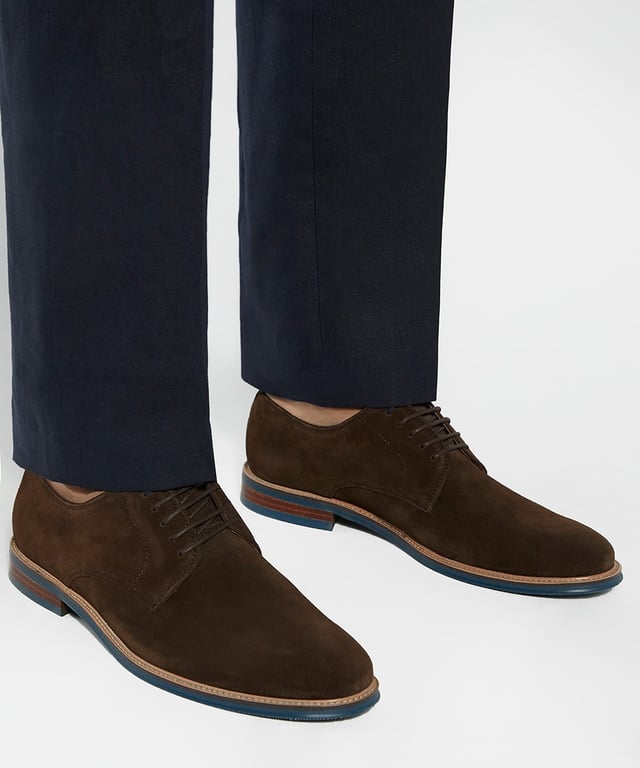 Refresh your sartorial edit with Stanleyyy. Crafted from the finest material, this round-toed silhouette features a five-eyelet system and is detailed with tonal stitch details and a wooden veneer sole, enhanced with a contrast-stitch trim.