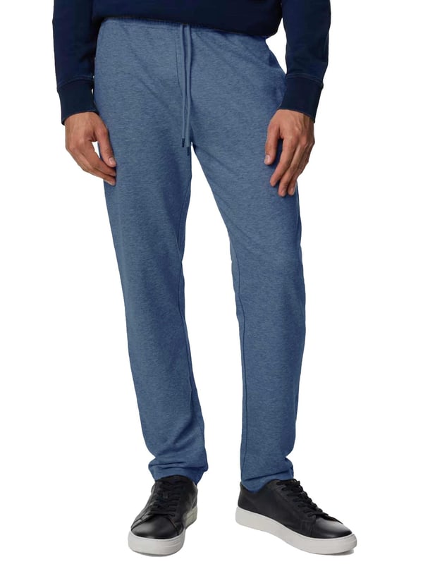 The Kruze Open Hem Joggers offer the perfect blend of comfort and functionality. Designed with an open hem for a laid-back look, these joggers feature a ribbed, elasticated waistband with adjustable drawstrings for a secure, customized fit. Practicality is ensured with two concealed side zip pockets and a single back zip welt pocket, providing secure storage for your essentials. Crafted with soft fleece lining, these joggers promise warmth and comfort, making them ideal for both lounging and casual outings