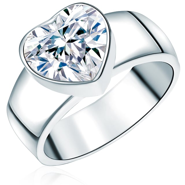 This magnificent band ring from Rafaela Donatas Classic Collection would like to stand out at all costs and he succeeds with flying colors! This is mainly responsible for this, the heart -shaped ring head, which is occupied with a beautifully sparkling zirconia and simply steals the show from other pieces of jewelry due to its prominent size. So that the crystal does not feel lost on your finger, a wide ring shape made of high -gloss sterling silver was optioned, which makes the entire ensemble an eye -catcher par excellence. As a soloist on her hand, his enormous radiance is only really revealed.