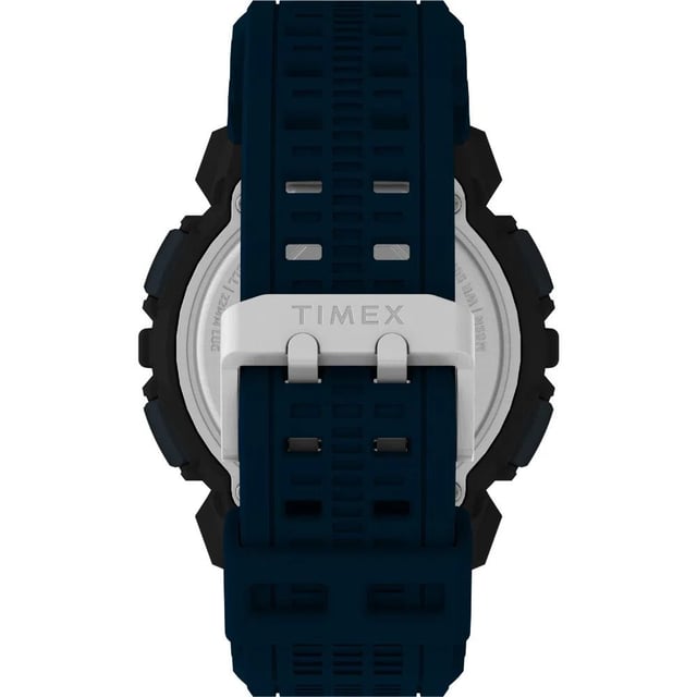 Dit Timex Ufc Striker Digitaal Horloge voor Heren is het perfecte tijdpiece om te dragen of cadeau te geven. De zwarte ronde kast van 49 mm in combinatie met de comfortabele blauwe kunststof horlogeband zorgt ervoor dat je van dit verbluffende horloge kunt genieten zonder compromissen. Aangedreven door een hoogwaardige quartzbeweging en waterbestendig tot 5 bar, blijft je horloge tikken. Dit digitale horloge is ideaal voor elke gelegenheid. Of het nu bij officiële evenementen is, op de tennisbaan of in de country club - met dit horloge maak je overal een goede indruk. Dit horloge heeft een stopwatch, dual time, alarm en een lichtfunctie. Hoogwaardige blauwe kunststof band van 21 cm lang en 26 mm breed met een gesp. Kastdiameter: 49 mm, kastdikte: 15 mm, kastkleur: zwart en wijzerplaatkleur: zwart.