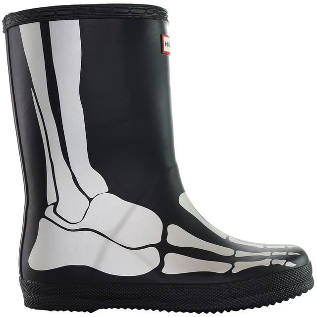 Hunter First Reflective Kids Black Wellington Boots â€“ a perfect blend of safety, style, and durability for the youngest adventurers. Designed with little ones in mind, these boots not only keep their feet dry on rainy days but also add a playful touch with reflective detailing. Here's a detailed description highlighting the key features of these boots:

 Child-Friendly Design:  The Hunter First Reflective Kids Boots are crafted with the comfort and safety of little feet in mind. The design is specifically tailored for children, providing an easy-to-wear, lightweight, and flexible fit.

 Reflective Detailing:  Safety meets style with the reflective detailing on these boots. The black surface comes to life when exposed to light, ensuring enhanced visibility in low-light conditions. This feature adds an extra layer of protection, making your child more visible during evening walks or gloomy weather.

 Waterproof Protection:  Let your little ones splash and play without worry. These Wellington boots are constructed with high-quality, waterproof materials, keeping their feet dry and comfortable in rain or puddles. The durable design ensures long-lasting performance, even with active play.

 Easy On and Off:  The pull-on style with a convenient pull tab makes these boots easy for kids to put on and take off independently. Say goodbye to struggles with laces or complicated closures â€“ these boots are designed for hassle-free wear, promoting independence for young adventurers.

 Comfortable Lining:  The interior of the boots is lined for added comfort during extended wear. The soft lining helps keep little feet cozy, making these boots a reliable choice for all-day adventures, whether it's a walk in the park or exploring nature trails.

 Durable Construction:  Built to withstand the energy and enthusiasm of active kids, these boots feature a sturdy construction that can handle rough and tumble play. The high-quality rubber material ensures durability, making them a reliable companion for various outdoor activities.

 Grip and Stability:  The treaded outsole provides excellent grip and stability on different surfaces, ensuring that your child can confidently explore various terrains without slipping. Whether it's wet grass, mud, or pavement, these boots offer reliable traction.

 Easy to Clean:  Parents will appreciate the easy maintenance of these boots. The smooth surface allows for quick and simple cleaning â€“ just wipe off any dirt or mud, and they're ready for the next adventure.

Equip your little explorer with the Hunter First Reflective Kids Black Wellington Boots â€“ where safety and style come together to create a footwear experience that both kids and parents will love. Let them step out in confidence, ready for whatever outdoor fun comes their way.