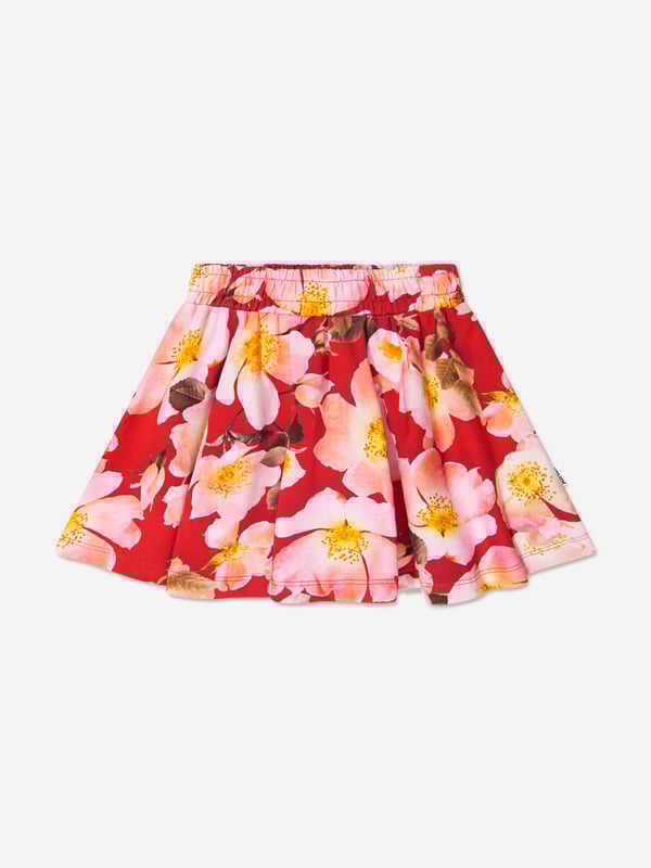 This Molo girls' skirt is made from 100% organic cotton and is a gorgeous piece of clothing for little girls. It comes in a beautiful pink floral print that is both casual and stylish. Perfect for party looks and day outings alike, she'll be feeling sweet and comfortable all day long.·  Molo·  Made in India·  Occasion: Casual·  Print