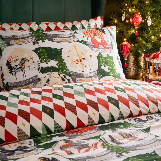 Welcome to the show! Presenting an enchanting collection of scenic snow globes inspired by the circus and festive fairgrounds. This fabulous extravaganza features festive characters and wandering exotic animals, because what’s life without whimsy? Perfect for themed Christmas bedrooms, the Showtime duvet cover set is complete with a harlequin diamond reverse for an alternative look.