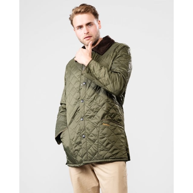 The Liddesdale provides plenty of room for laying and a generous fit, we suggest you go down one size if you prefer to wear this as a summer jacket. One of the most iconic Barbour jackets, the original Liddesdale jacket is a firm favourite year after year.
With Barbour's signature diamond quilted outer and a warm yet lightweight contrast nylon lining, this popular men's quilted jacket is durable, simple and stylish. From the Classic collection and available in a range of wearable colours, it features a robust front stud fastening to protect from the elements, and a smart sit-down cord collar that can be raised for additional warmth and protection, with a luxuriously soft feel against the skin.
With a generous fit, the Liddesdale provides plenty of room for layering up with chunky knits and insulating gilets, while the studded rear vents ensure comfort and ease of movement. The signature front patch pockets are trimmed with contrast Barbour embroidery and are generously proportioned, while a zipped inner security pocket safeguards valuables. A timeless addition to any winter wardrobe.

Regular Fit
100% polyamide
Two inch box quilted with 100g polyester wadding
Machine washable
Back length: 30-34in / 76.3-86.3cm